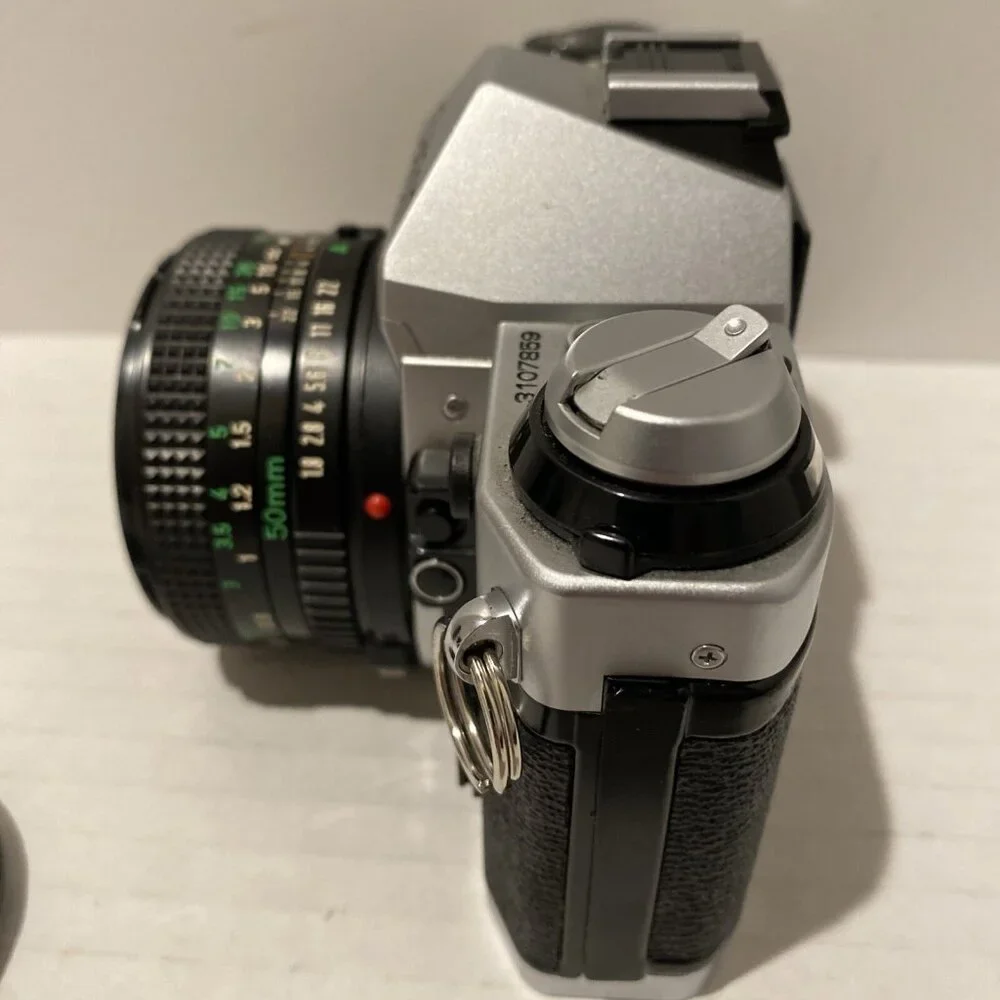 Canon Silver and Black Film Camera Kit with Lenses and Flash